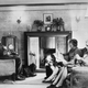 A man and two women occupy themselves with typical wartime leisure pursuits: reading, knitting, and listening to the radio, c. 1942. (Photo: Ministry Of Information Photo Division Photographer/IWM via Getty Images)